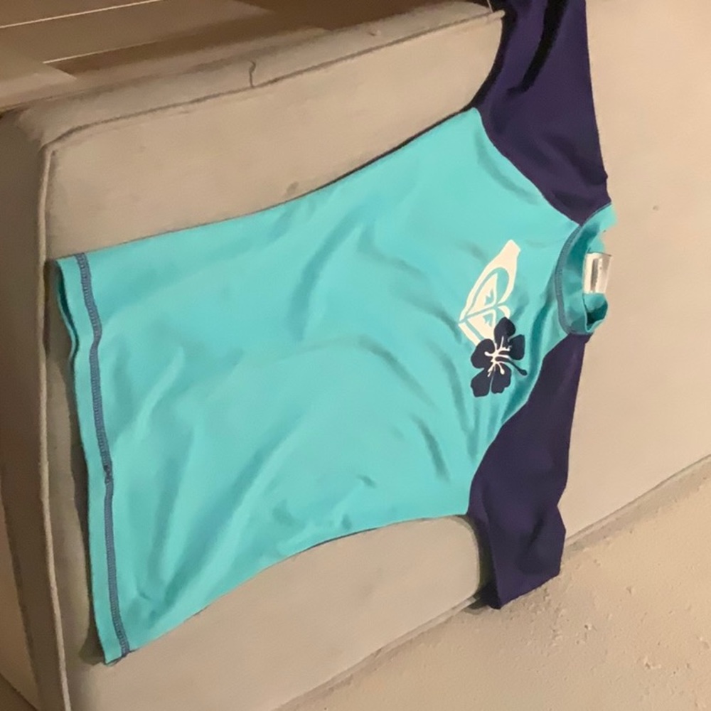 Teal and purple Roxy rash guard